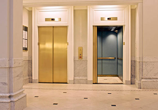برچسب طلایی درب آسانسور